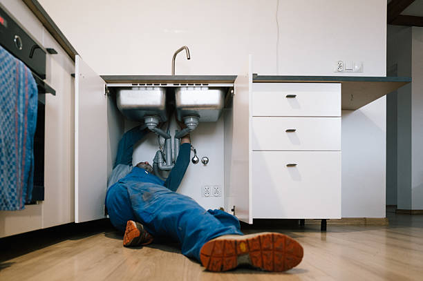 Professional Drain Cleaning technician working in Ravena, NY